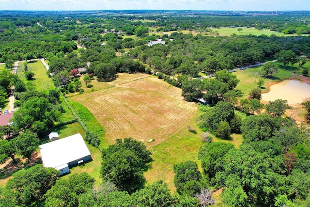 bird's eye view with a rural view and a water view