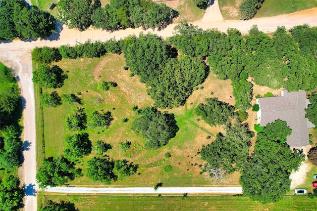 birds eye view of property featuring a rural view