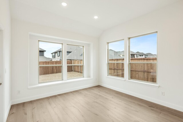 dining area with light hardwood / wood-style flooring and sink