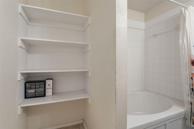 bathroom featuring shower / bath combo