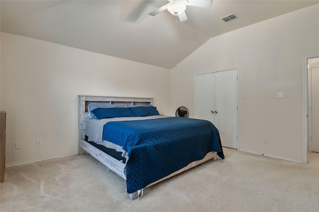 bedroom featuring carpet flooring, vaulted ceiling, and ceiling fan