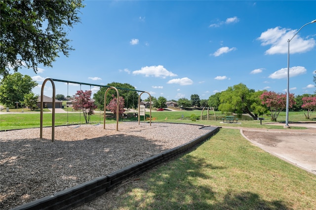 view of jungle gym with a yard