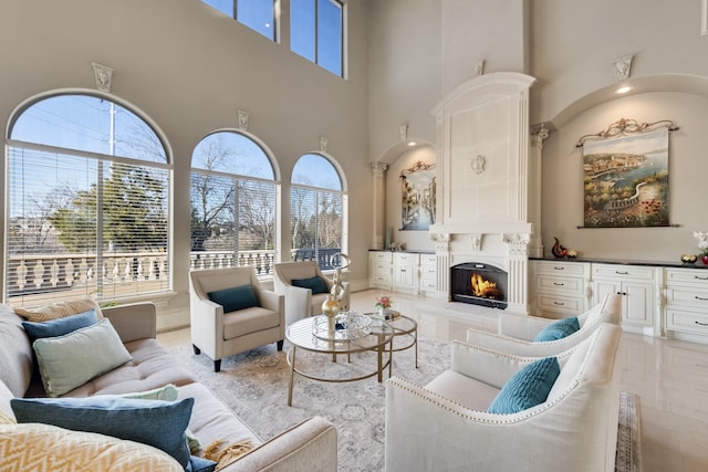 living room with a towering ceiling