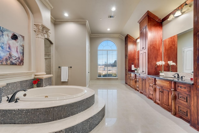 bathroom featuring ornamental molding, vanity, tile patterned floors, and tiled tub