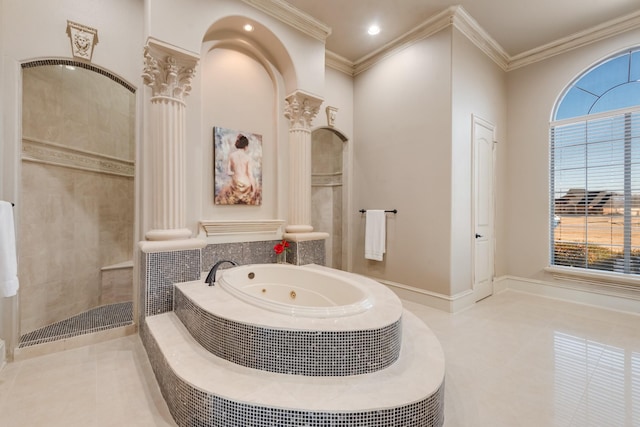 bathroom featuring crown molding, independent shower and bath, and ornate columns