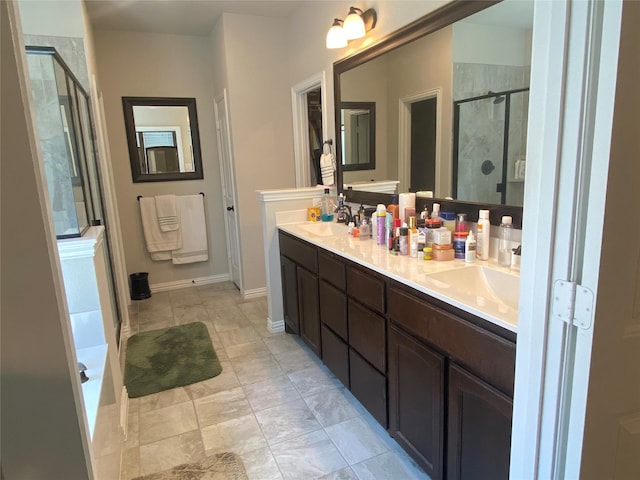 bathroom with vanity and an enclosed shower