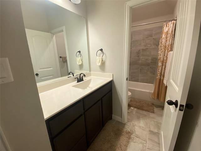 full bathroom featuring vanity, shower / bath combination with curtain, and toilet