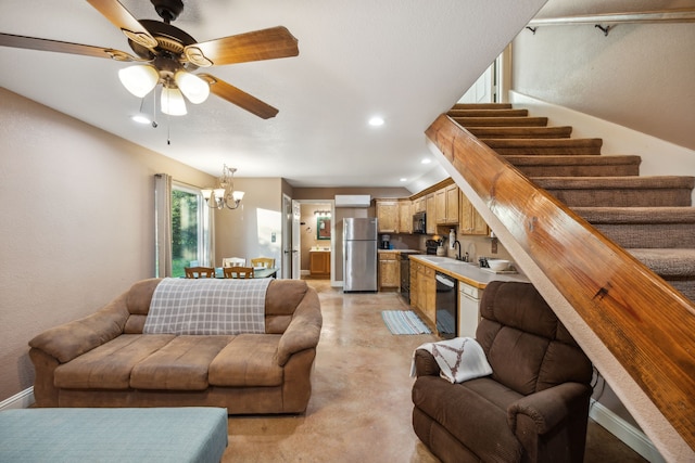 living room with ceiling fan with notable chandelier and sink