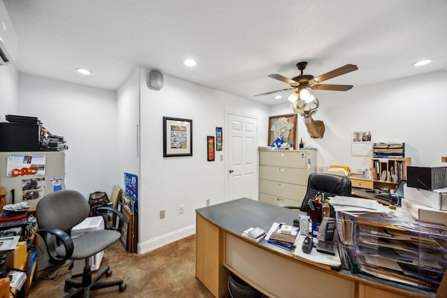 carpeted office space featuring ceiling fan