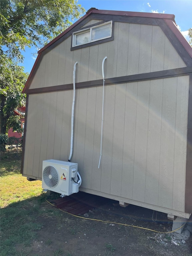 view of outbuilding with ac unit