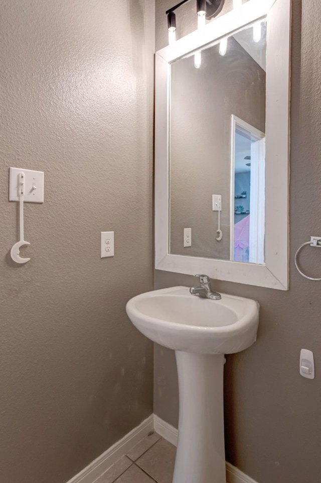 bathroom featuring tile patterned flooring