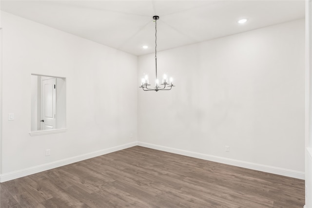 spare room featuring dark hardwood / wood-style floors