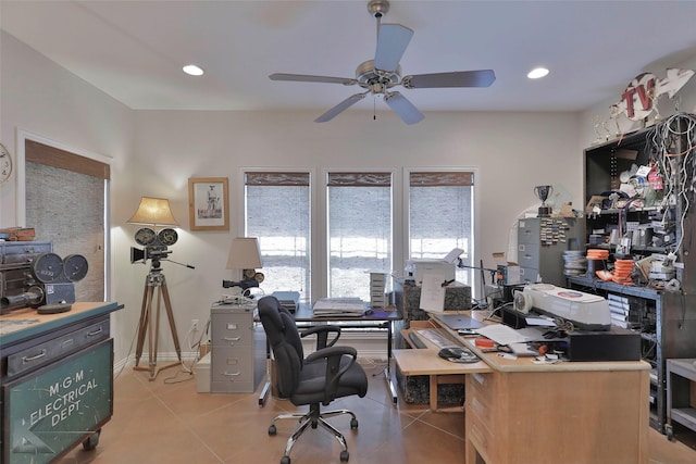 office space featuring ceiling fan and light tile patterned floors