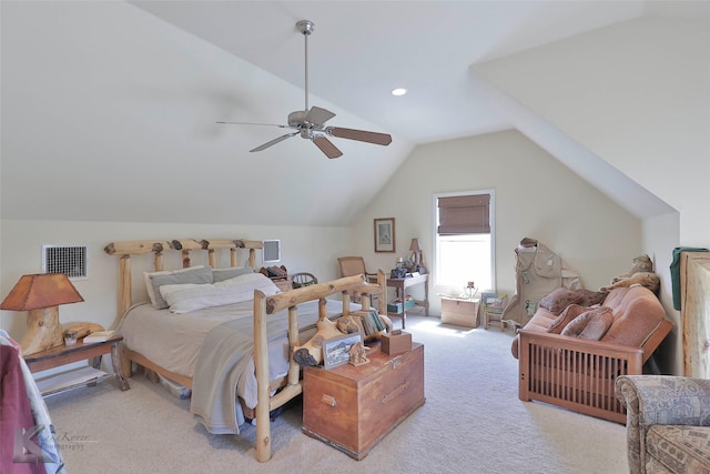 bedroom with light colored carpet, ceiling fan, and lofted ceiling