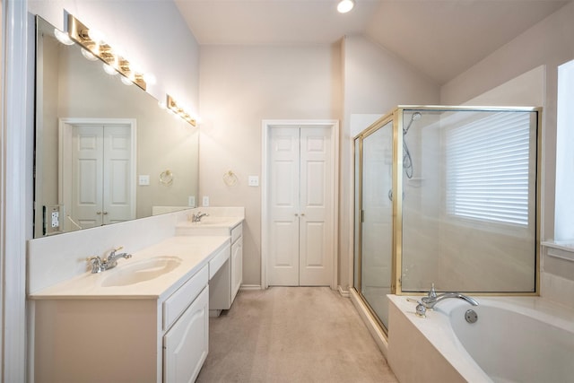 bathroom with vanity, plus walk in shower, and vaulted ceiling