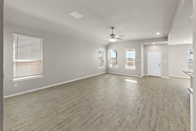 unfurnished living room featuring light wood-type flooring and ceiling fan