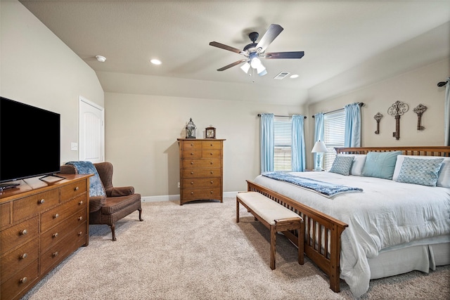 carpeted bedroom featuring vaulted ceiling and ceiling fan