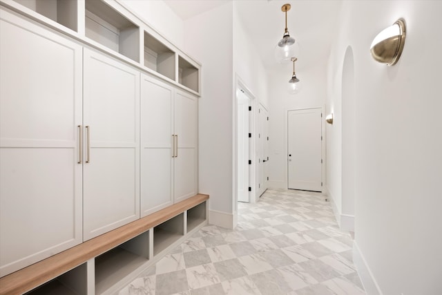 mudroom with light tile patterned floors