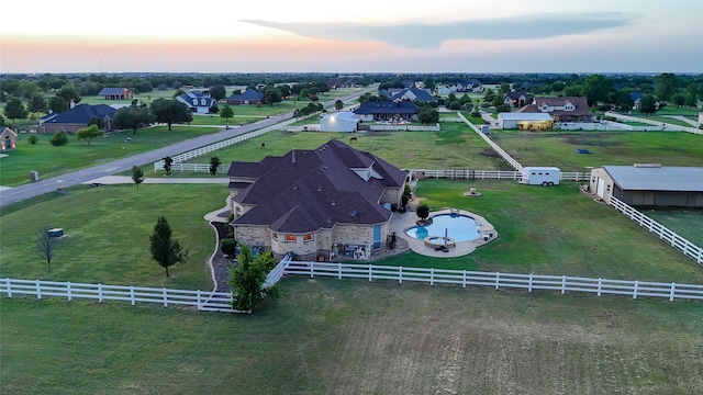 view of aerial view at dusk