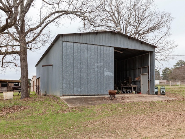 view of outdoor structure with a yard