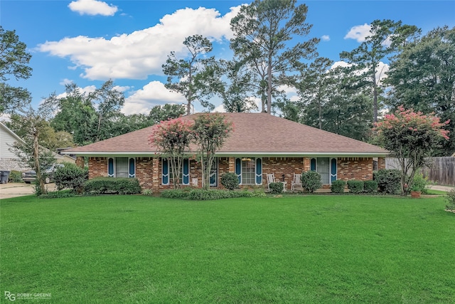 ranch-style house with a front yard