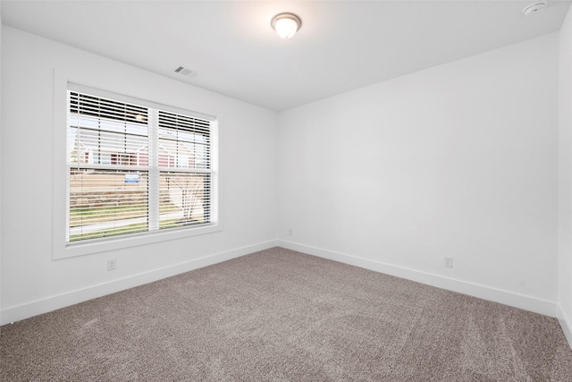 view of carpeted spare room