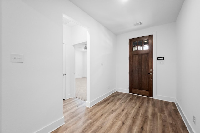 entrance foyer with light hardwood / wood-style flooring