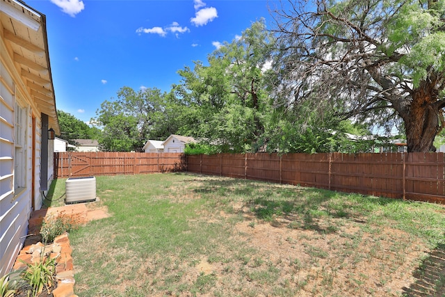 view of yard with central AC