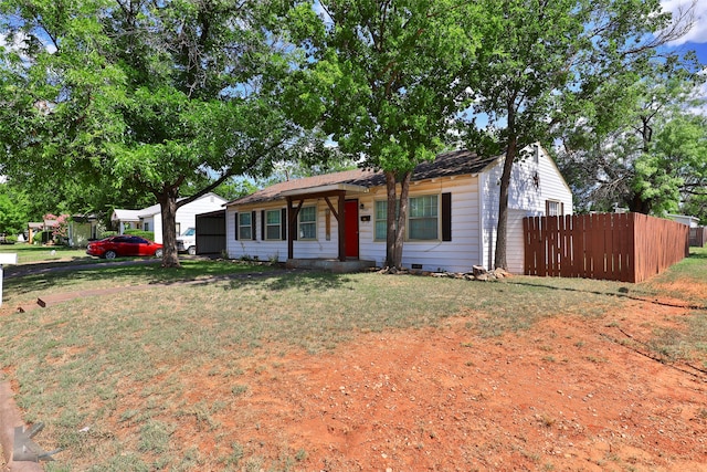 single story home with a front yard