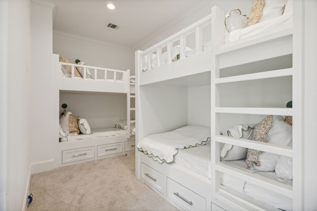 carpeted bedroom featuring ornamental molding