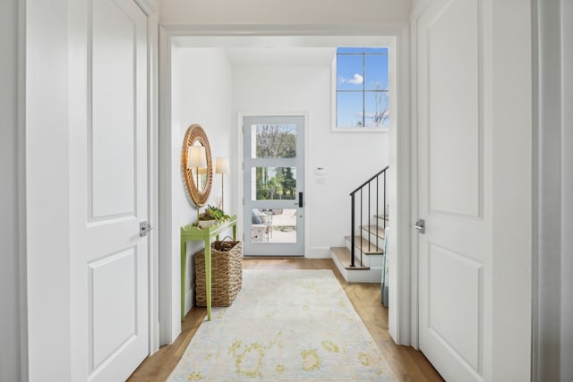 entryway with light wood-type flooring