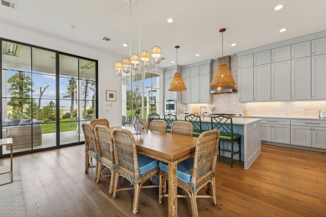 dining room featuring light hardwood / wood-style flooring