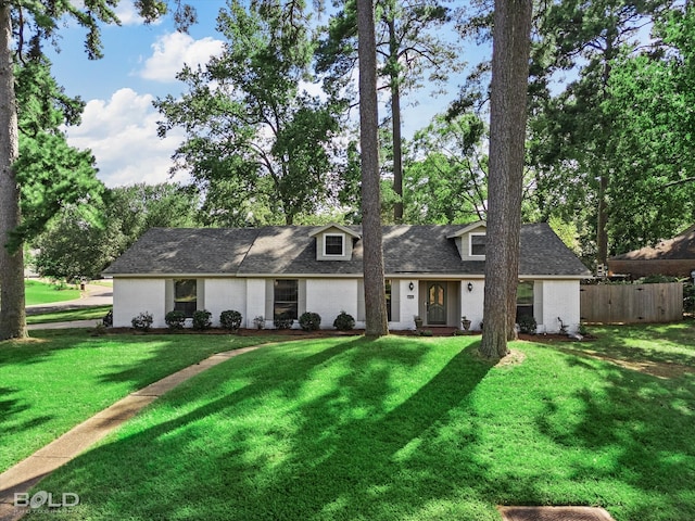 view of front of property with a front lawn