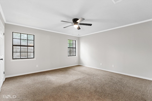 unfurnished room with carpet floors, ornamental molding, and ceiling fan