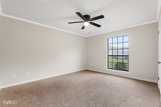 carpeted empty room with ceiling fan and crown molding