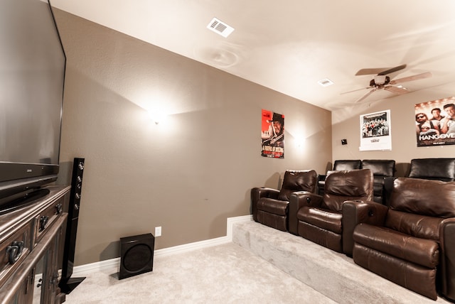 carpeted cinema with ceiling fan