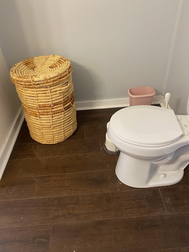 bathroom featuring toilet and hardwood / wood-style floors