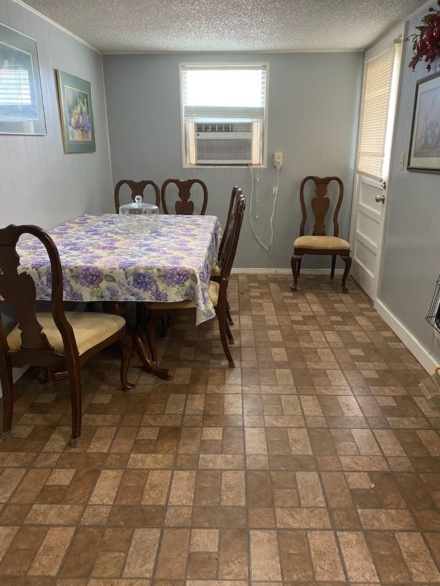 dining space featuring cooling unit