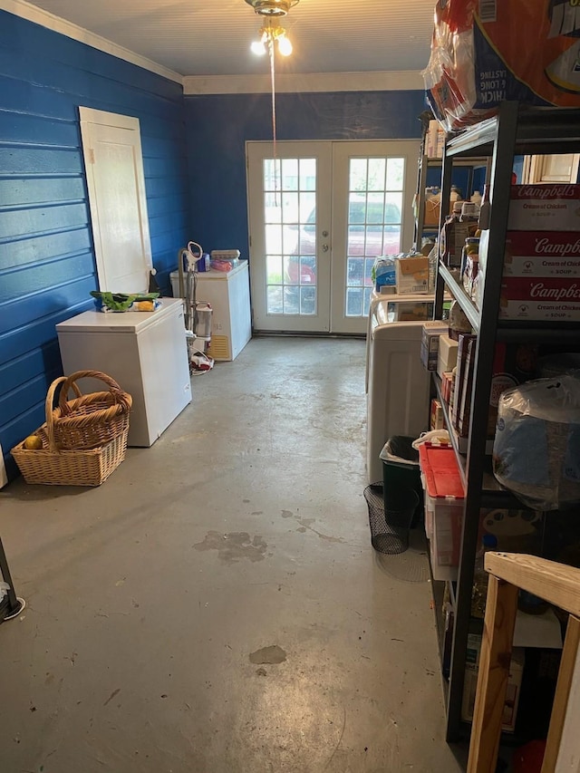 interior space with concrete floors and french doors