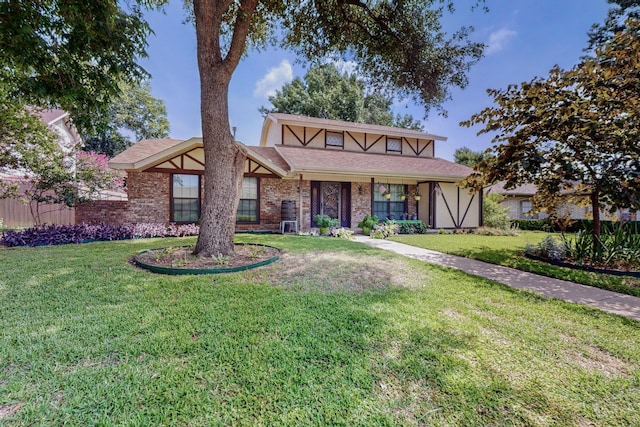 tudor house with a front yard