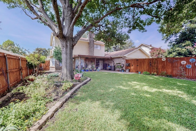 view of yard with a patio area