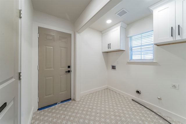 laundry area featuring hookup for a washing machine, hookup for an electric dryer, light tile floors, cabinets, and hookup for a gas dryer