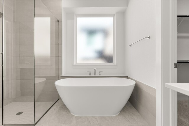 5241 Great Hollow Trl, Fort Worth, TX 76179 - bathroom featuring a freestanding tub and tiled shower