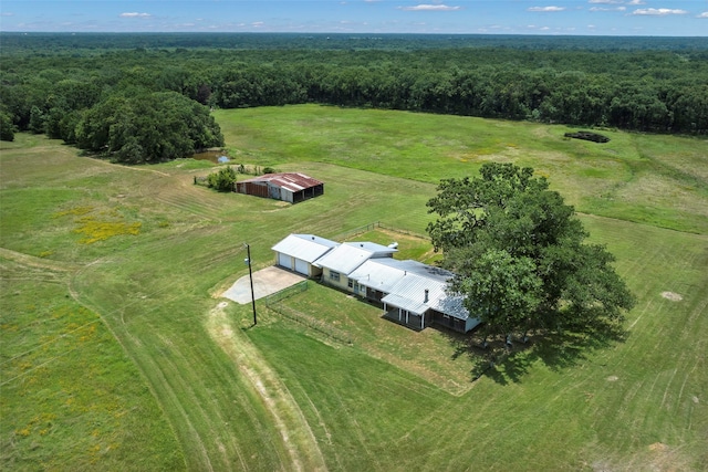 birds eye view of property with a rural view