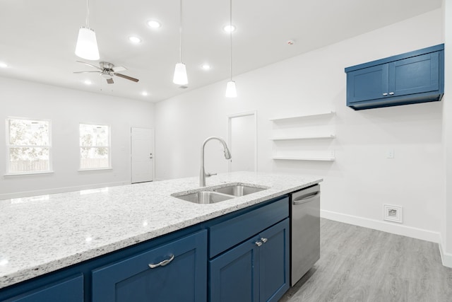 kitchen featuring light stone countertops, stainless steel dishwasher, ceiling fan, sink, and light hardwood / wood-style flooring