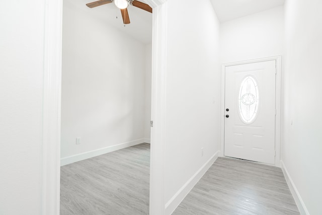 entryway featuring ceiling fan and light hardwood / wood-style floors