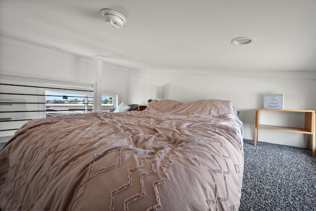 carpeted bedroom featuring crown molding