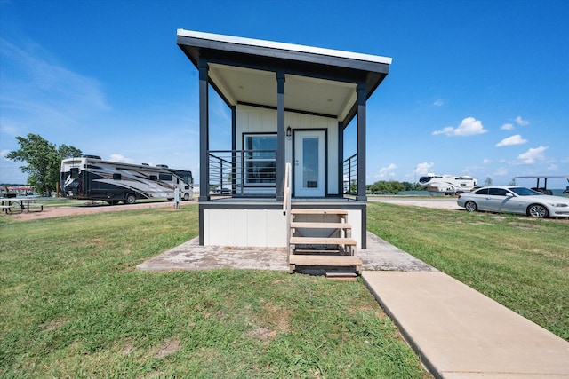 exterior space with a front lawn