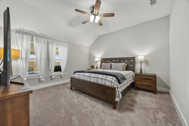 bedroom with carpet, vaulted ceiling, and ceiling fan