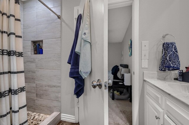 bathroom with vanity and a shower with shower curtain